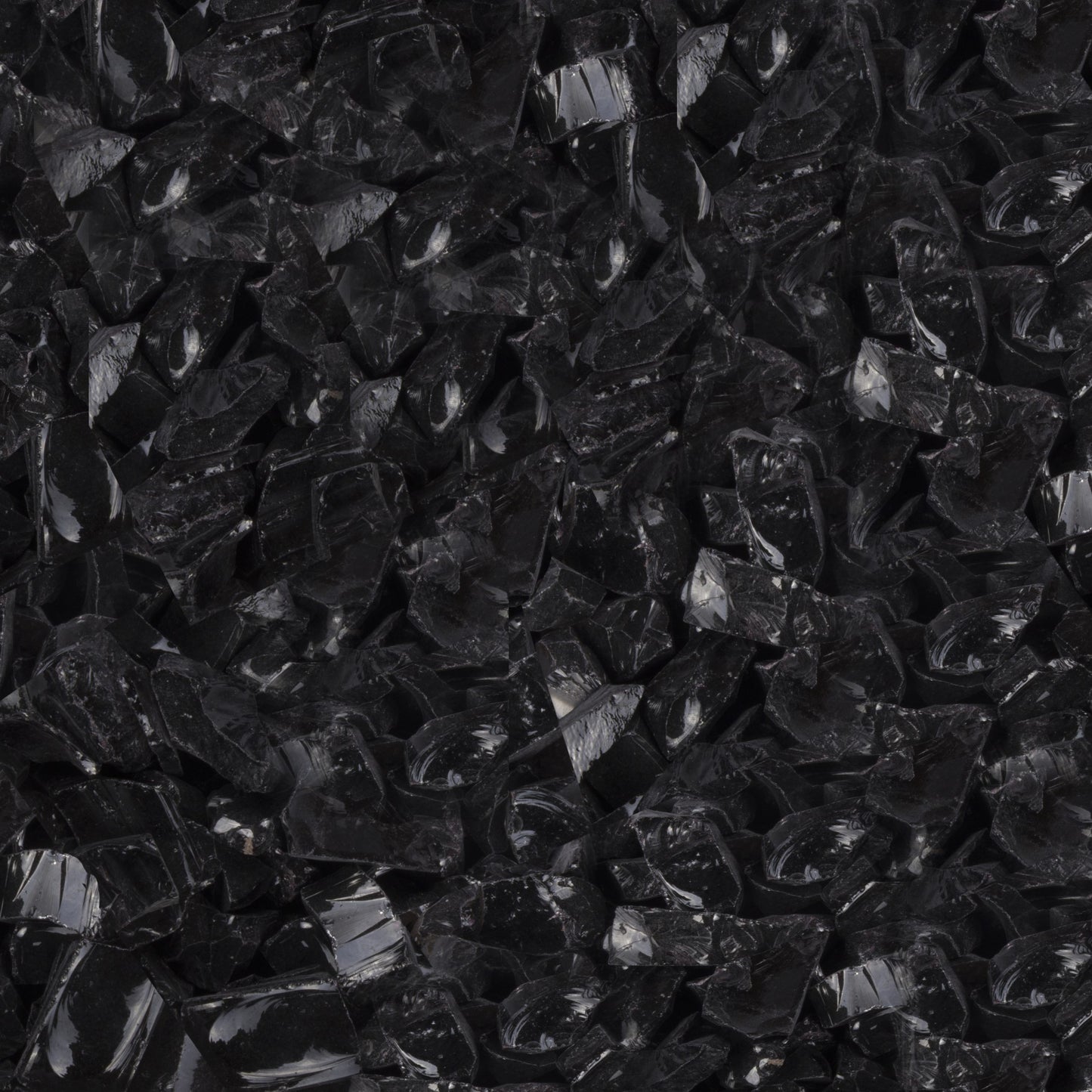 Gold-black Pinnacle black glass fire pit pebbles