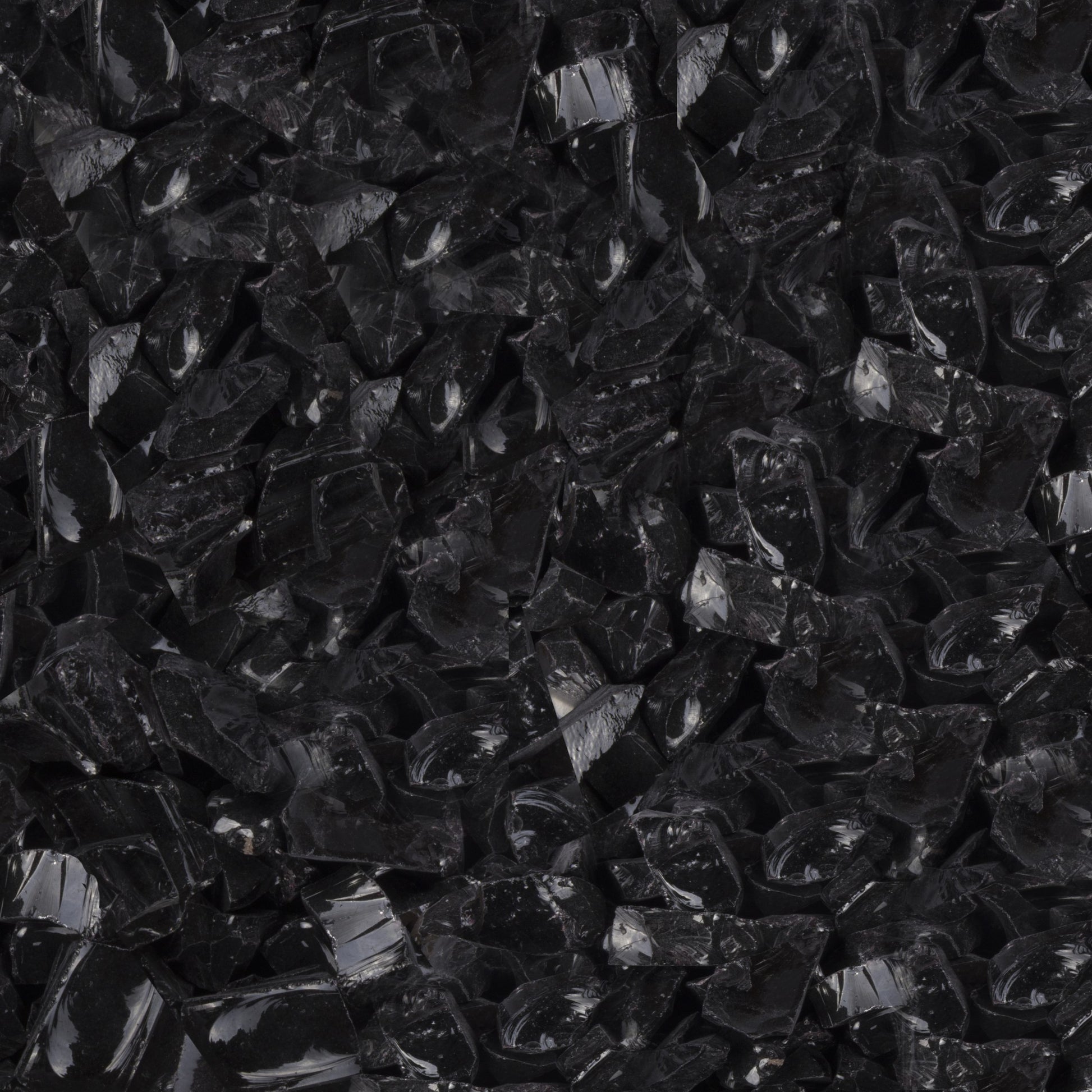 Gold-black Pinnacle black glass fire pit pebbles
