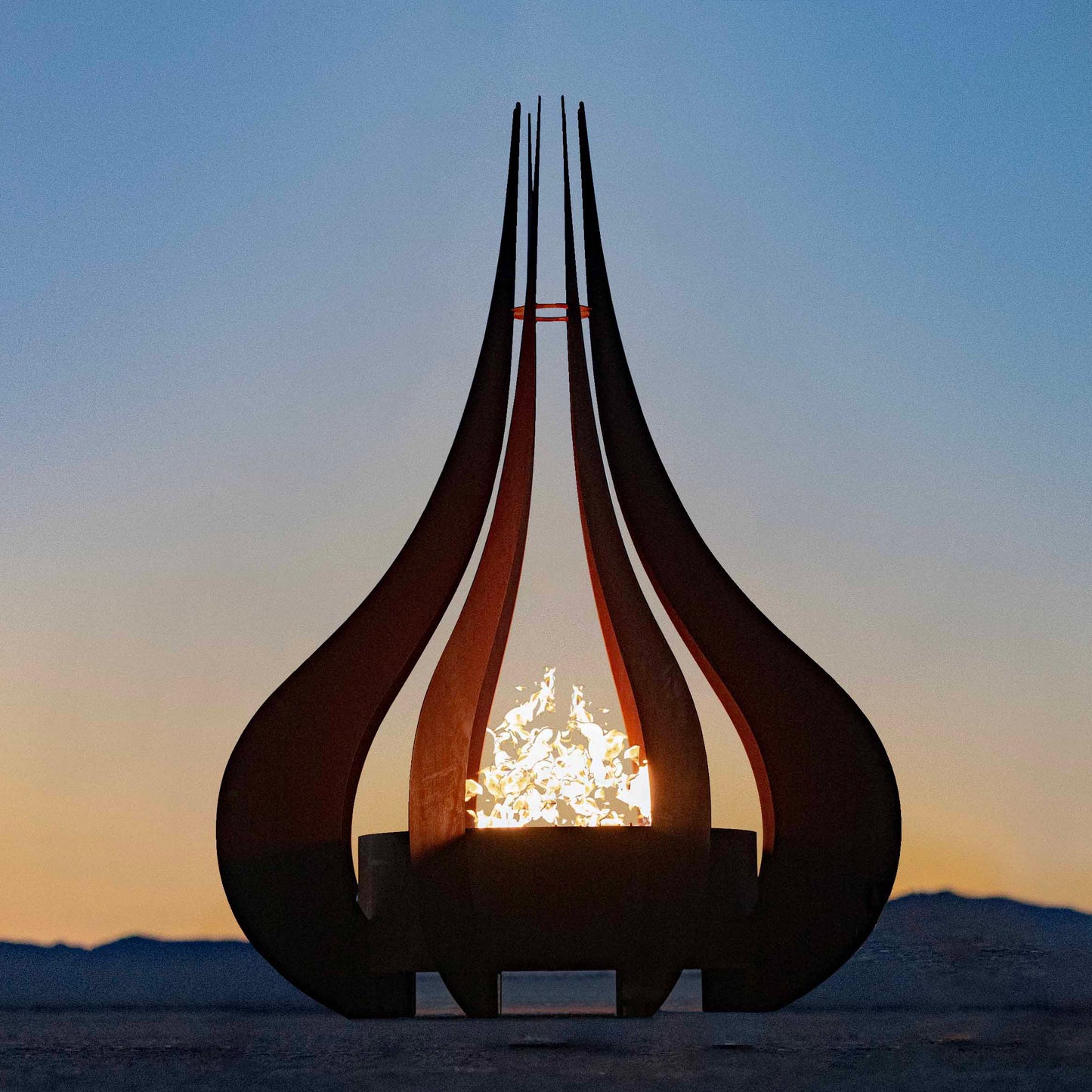 Gold-black Pinnacle fire sculpture matte steel with razor gold lip sleek modern fire sculpture