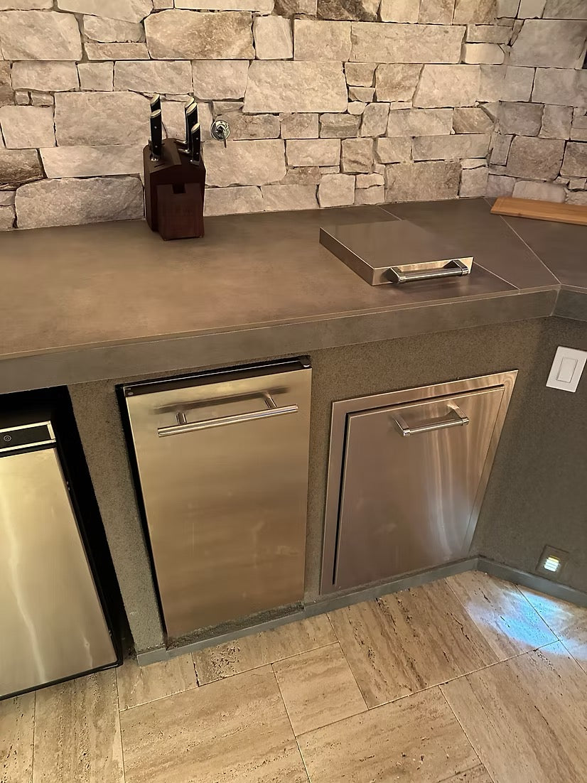 Gold-black Pinnacle outdoor kitchen built in stainless steel grill wine fridge luxury patio dining