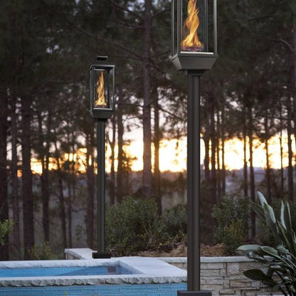 Tempest 20K gas lanterns on deck posts beside luxury outdoor pool