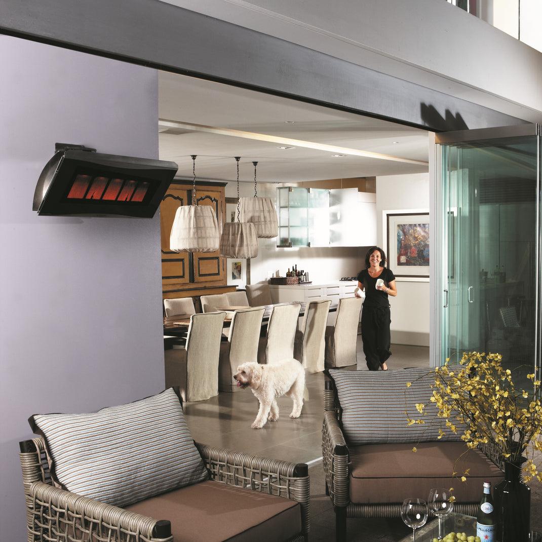 Bromic Platinum 300 Smart-Heat natural gas heater warming a modern outdoor dining and entertaining space