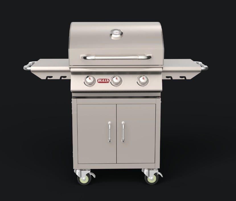 BULL Steer 24-inch 3-burner gas grill on stainless steel cart with side shelves, enclosed storage cabinet and locking casters.