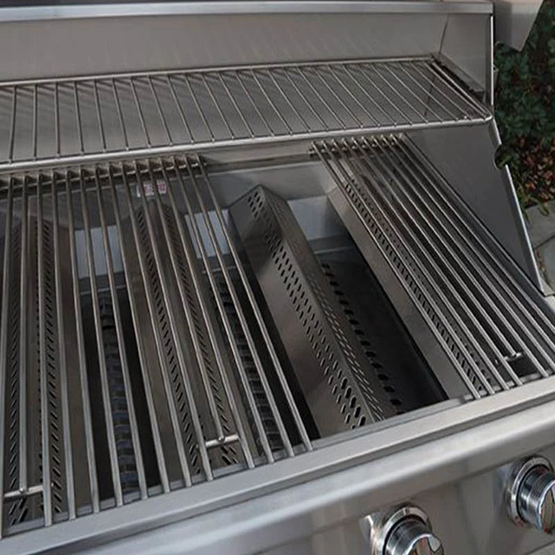 BULL Steer 24-inch 3-burner grill interior showing stainless steel cooking grates, warming rack and flame tamers.