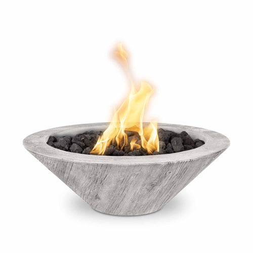 Cazo GFRC wood grain fire bowl in ivory finish with active flame over black lava rocks, modern outdoor fire feature for contemporary patios