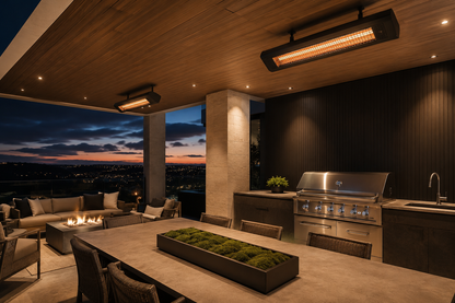 Luxury outdoor kitchen and dining space featuring ceiling-mounted Bromic patio heaters, built-in stainless grill, and modern fire lounge overlooking a city skyline at sunset.