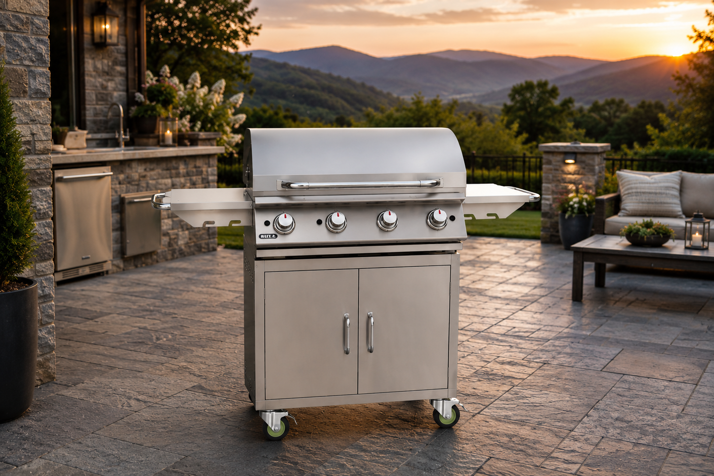 Bull 30-inch stainless steel griddle complete cart on an upscale stone patio with outdoor kitchen and mountain views.