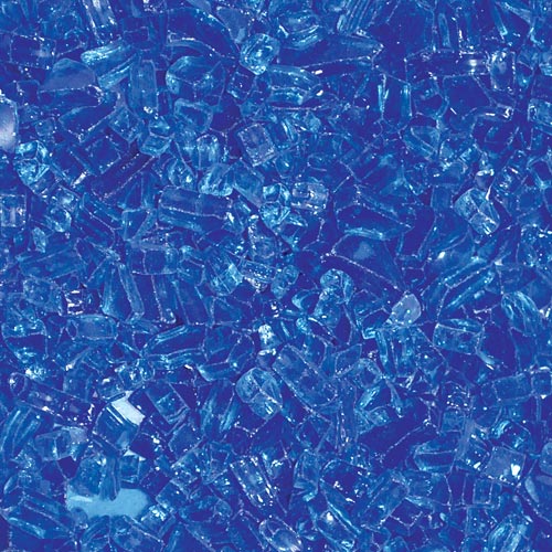Brilliant cobalt blue fire pit glass chips for vibrant outdoor fire features.