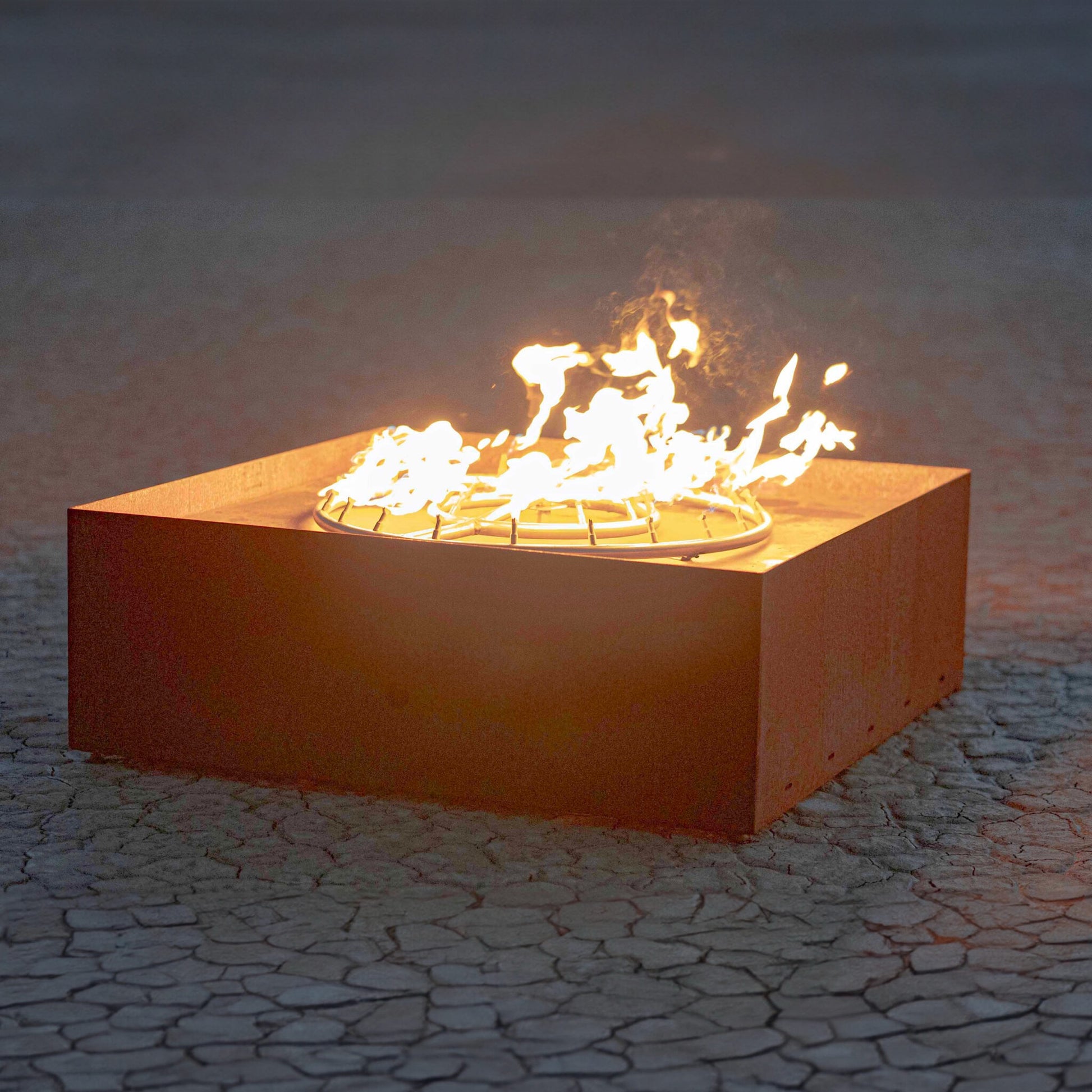 Gold-black Pinnacle fire sculpture matte steel with razor gold lip sleek modern fire sculpture