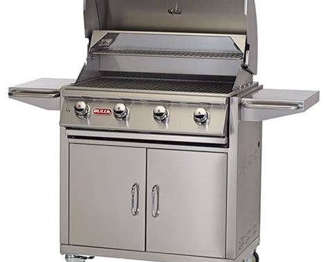 Bull Lonestar Select 4-burner stainless steel grill cart with hood open, showing cooking grates and warming rack.