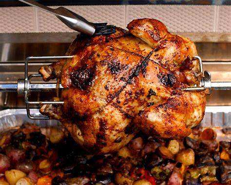 Blaze 32-inch grill rotisserie cooking whole chicken