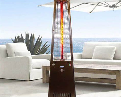 Lava Heat Italia 2G Flame Tower patio heater providing radiant heat on a luxury outdoor terrace