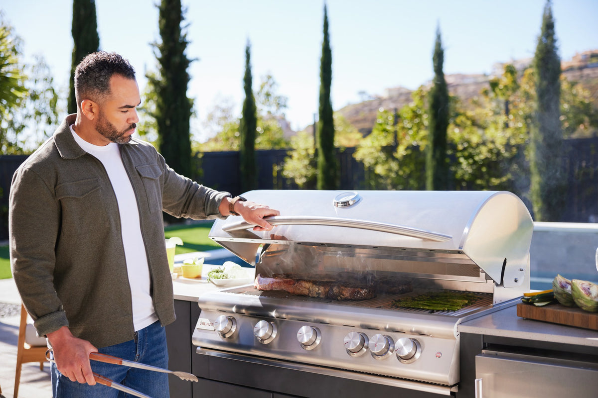 Blaze LTE+ 40-inch gas grill installed in a luxury outdoor kitchen at sunset