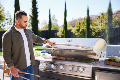 Blaze LTE+ 40-inch gas grill installed in a luxury outdoor kitchen at sunset