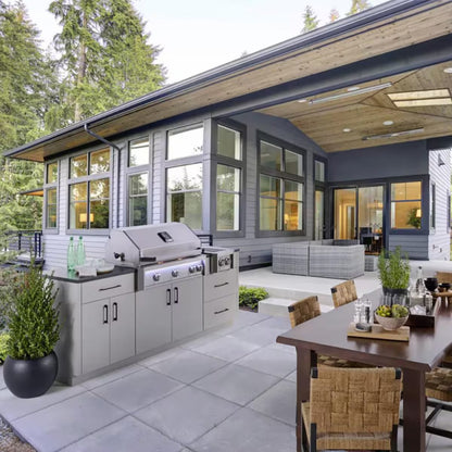 American Outdoor Grill 30-in L-Series built-in gas grill in outdoor kitchen island on modern patio