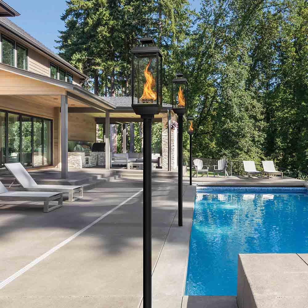 Tempest 50K outdoor gas lantern illuminating backyard entertaining area