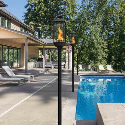 Tempest 50K outdoor gas lantern illuminating backyard entertaining area
