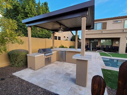 Gold-black Pinnacle outdoor kitchen built in stainless steel grill wine fridge luxury patio dining