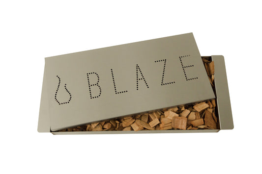 Blaze smoker box filled with wood chips for gas grill smoking